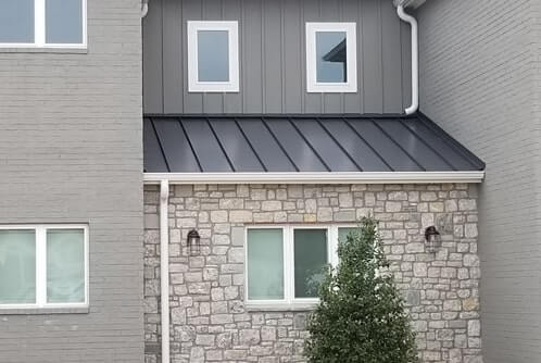 Side view of a house with a Standing Seam Roof